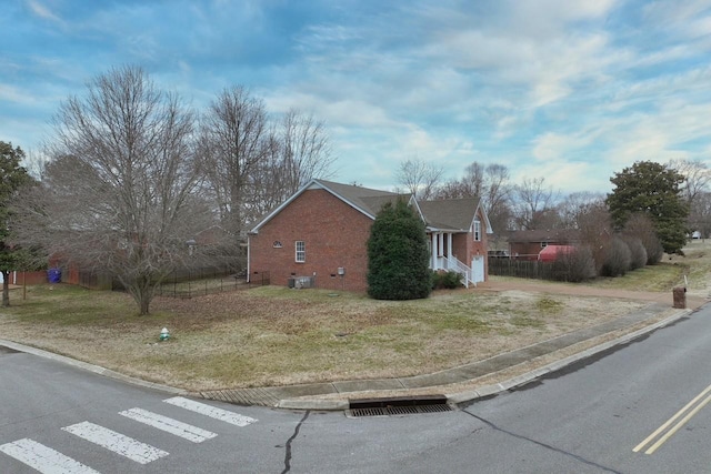 view of property exterior featuring a yard