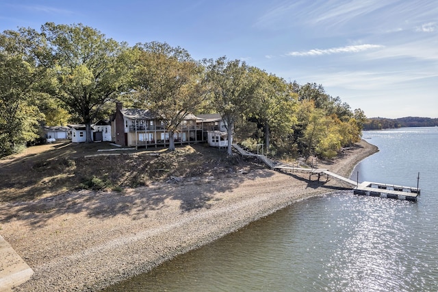 exterior space with a water view