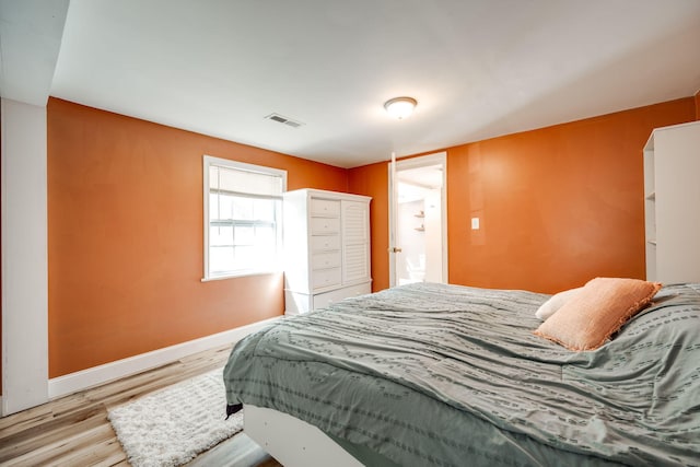 bedroom featuring light wood-type flooring