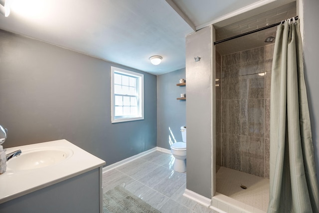 bathroom with vanity, toilet, tile patterned flooring, and a shower with shower curtain