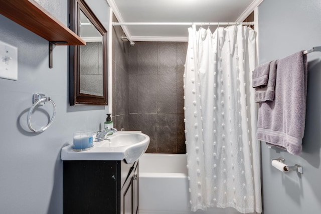 bathroom with vanity, crown molding, and shower / bath combination with curtain