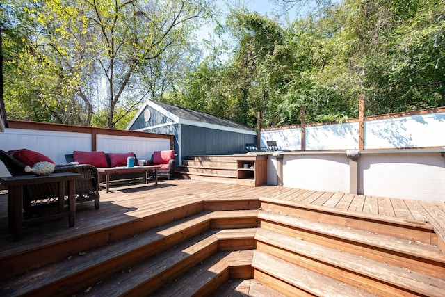 wooden terrace featuring an outdoor hangout area