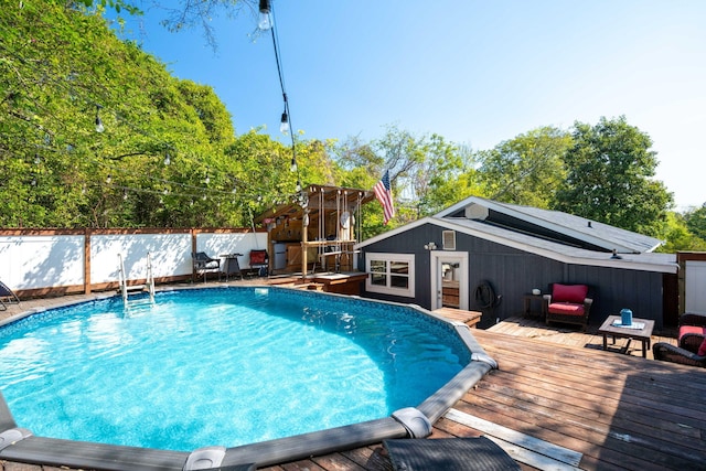 view of pool featuring a deck