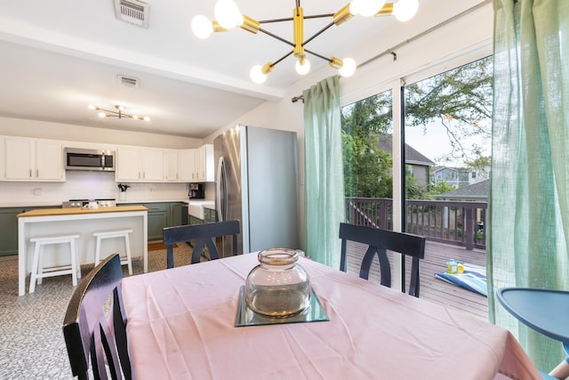 dining area with a chandelier