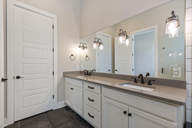 bathroom with vanity and tile patterned flooring