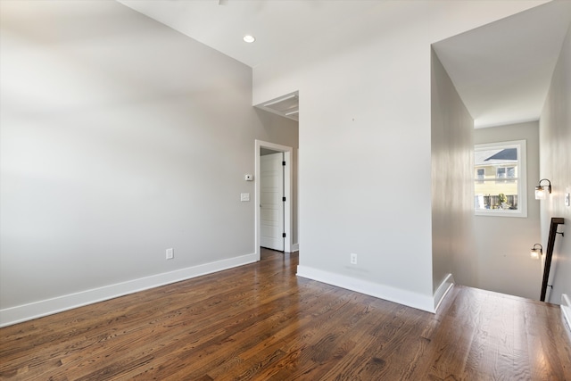 spare room featuring dark hardwood / wood-style floors