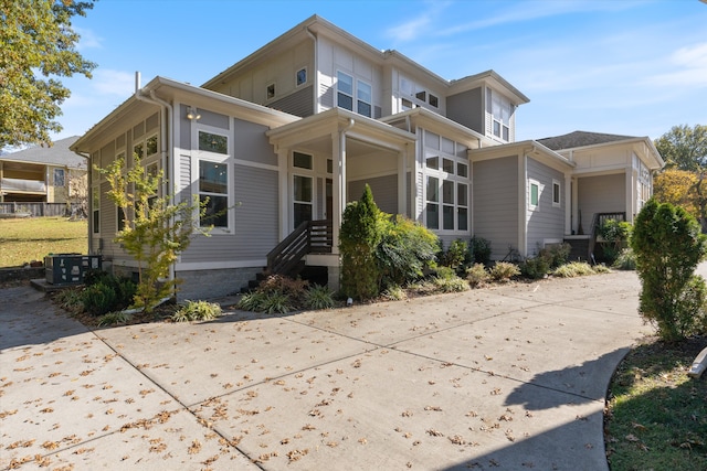 view of front of home featuring central air condition unit