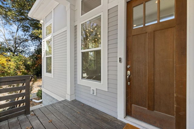 doorway to property with a wooden deck