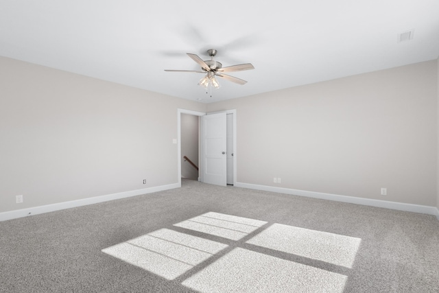 unfurnished room with carpet floors and ceiling fan