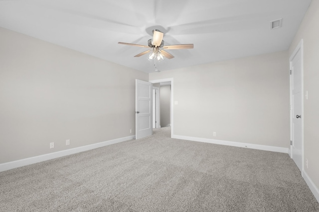 carpeted empty room with ceiling fan