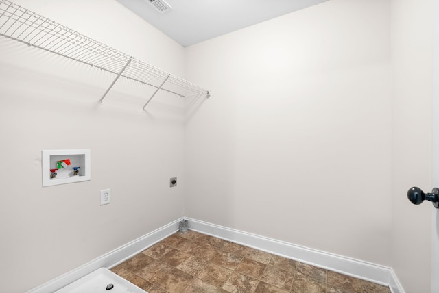 clothes washing area featuring washer hookup and hookup for an electric dryer