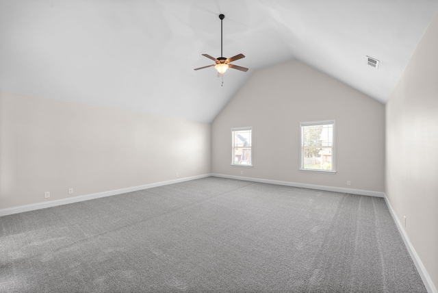 interior space featuring carpet, lofted ceiling, and ceiling fan