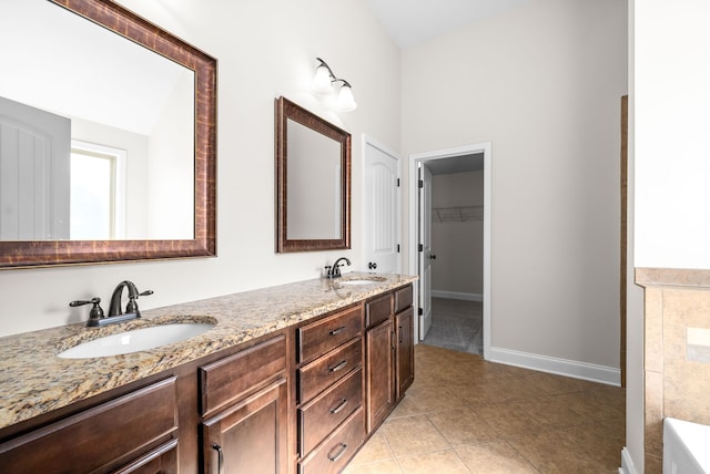 bathroom featuring vanity and tile patterned floors