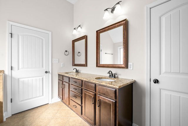 bathroom featuring vanity and tile patterned flooring