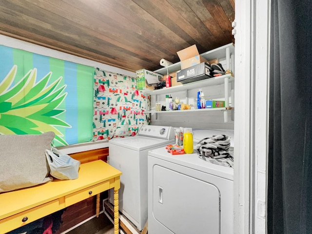 laundry area featuring wooden ceiling and independent washer and dryer