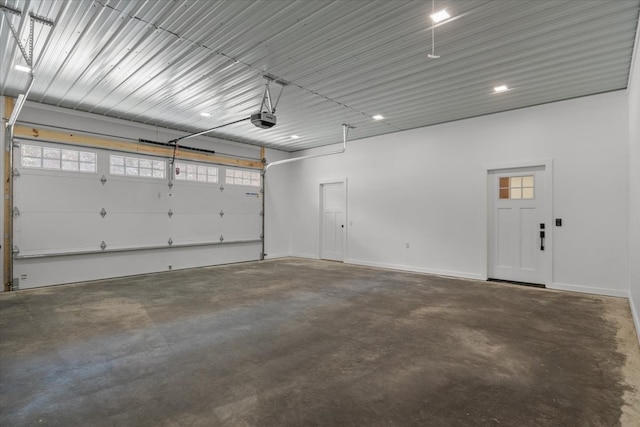 garage featuring a garage door opener