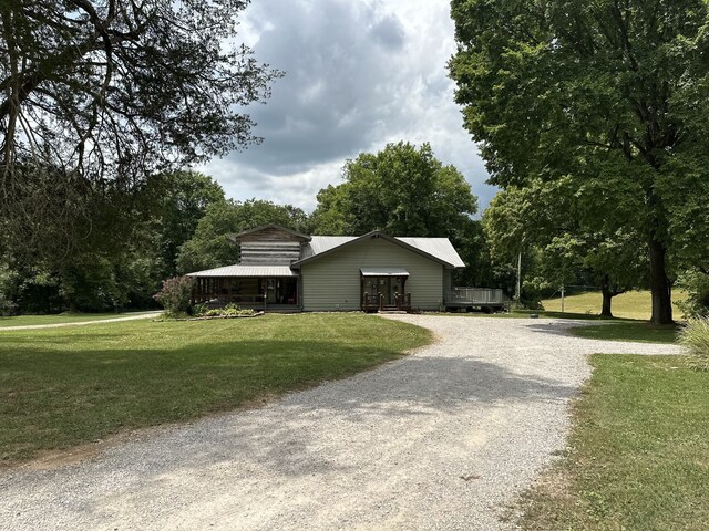 exterior space with a front yard