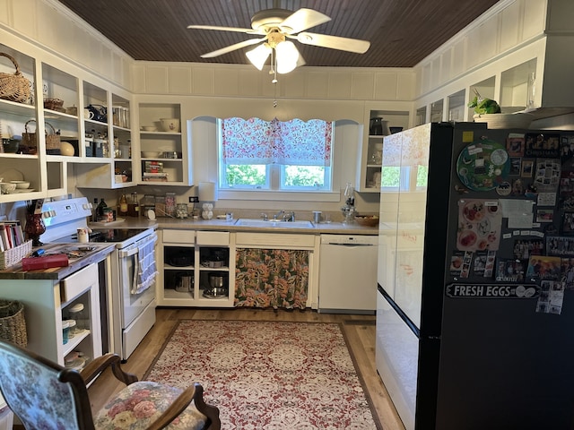 kitchen with wood ceiling, ceiling fan, crown molding, sink, and white appliances