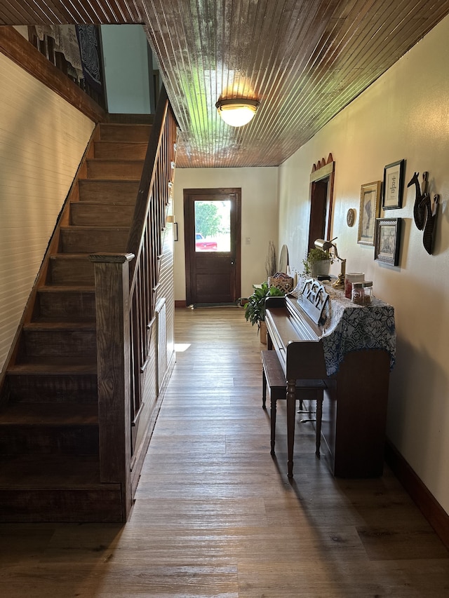 interior space featuring wood ceiling and wood-type flooring