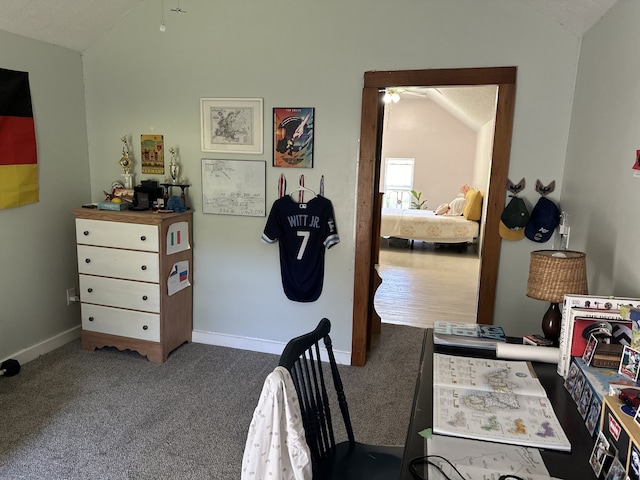 carpeted bedroom with vaulted ceiling