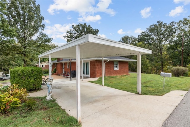 view of patio / terrace with a carport