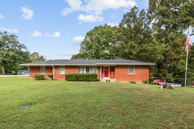 ranch-style house with a front lawn