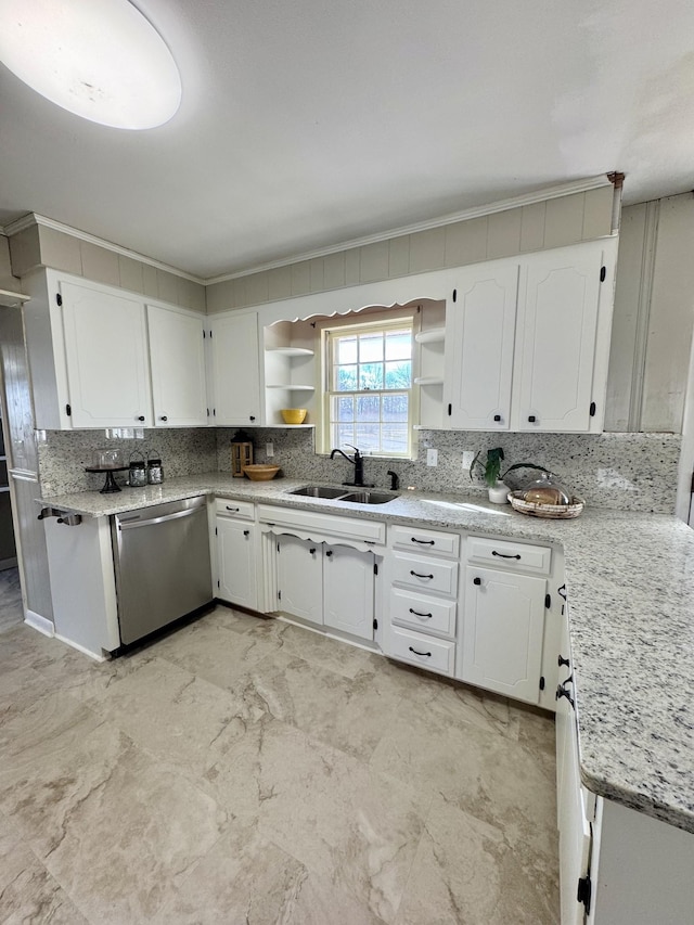 kitchen with decorative backsplash, dishwasher, crown molding, white cabinets, and sink