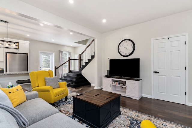 living room featuring dark hardwood / wood-style floors