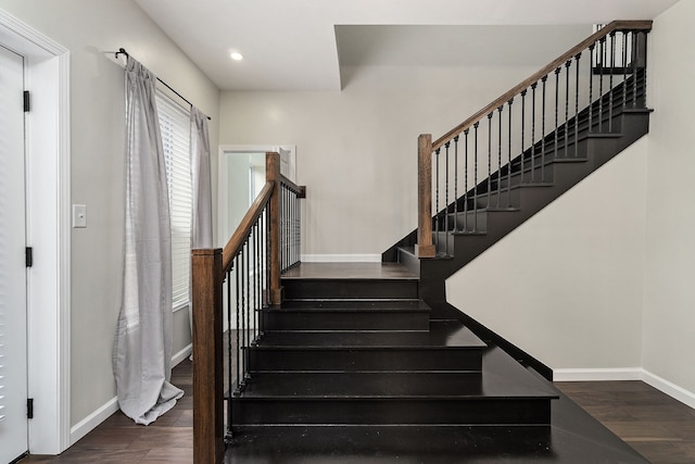 stairway with wood-type flooring