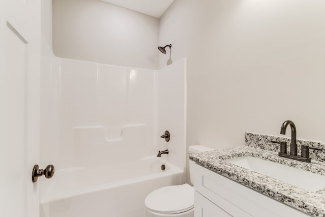 full bathroom featuring vanity, shower / bathtub combination, and toilet