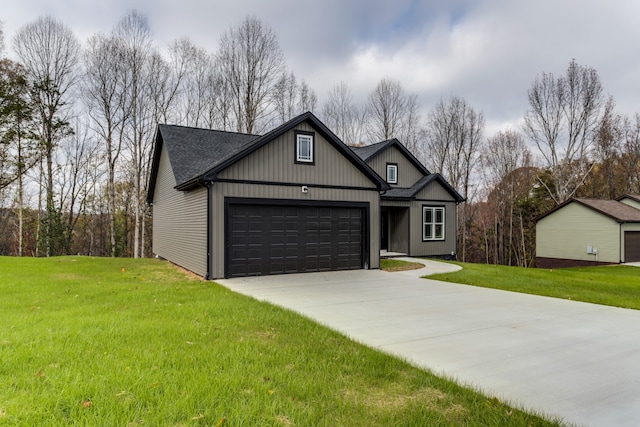 view of front facade featuring a front yard and a garage