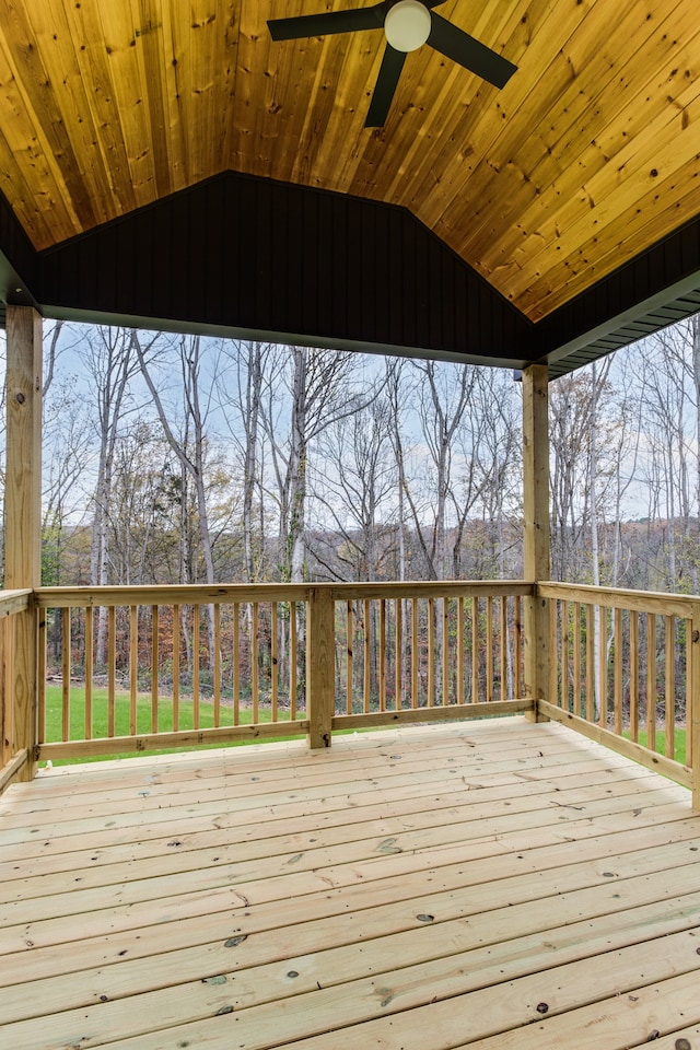 wooden deck featuring ceiling fan