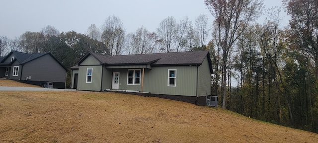 view of front of home featuring central air condition unit