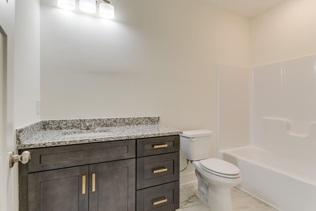 full bathroom featuring washtub / shower combination, toilet, and vanity