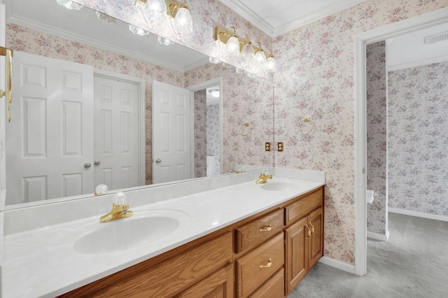 bathroom featuring ornamental molding and vanity