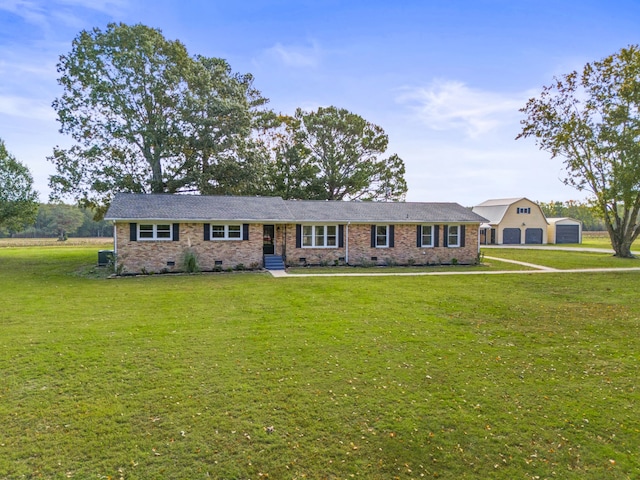 ranch-style home featuring a front yard