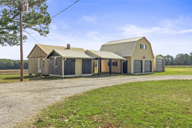 view of front of house with a front lawn and a garage