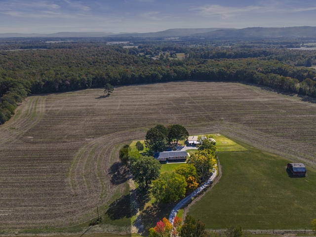 drone / aerial view with a mountain view and a rural view