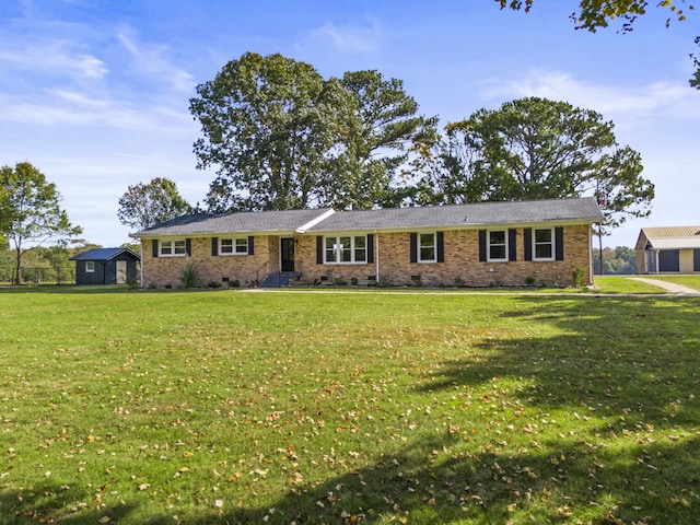 ranch-style home with a front lawn