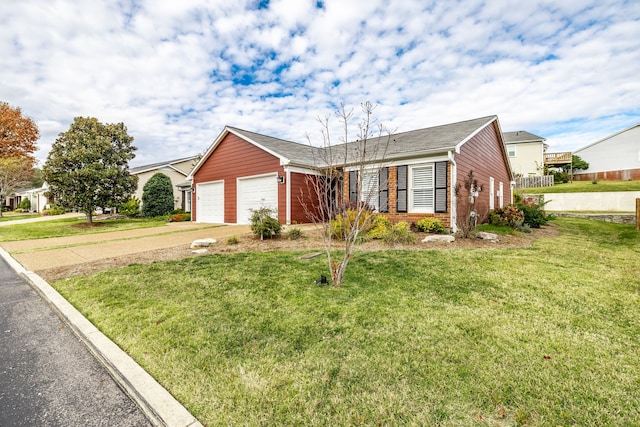 single story home with a garage and a front lawn