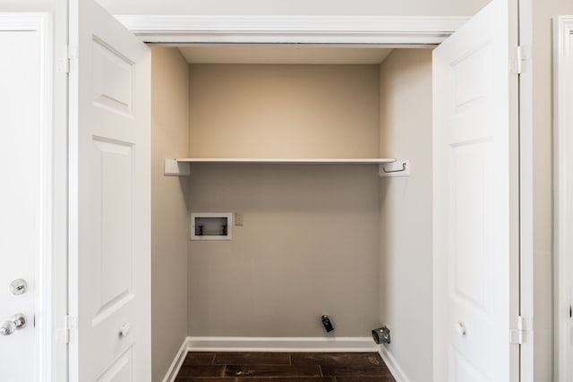 washroom featuring washer hookup and dark hardwood / wood-style flooring