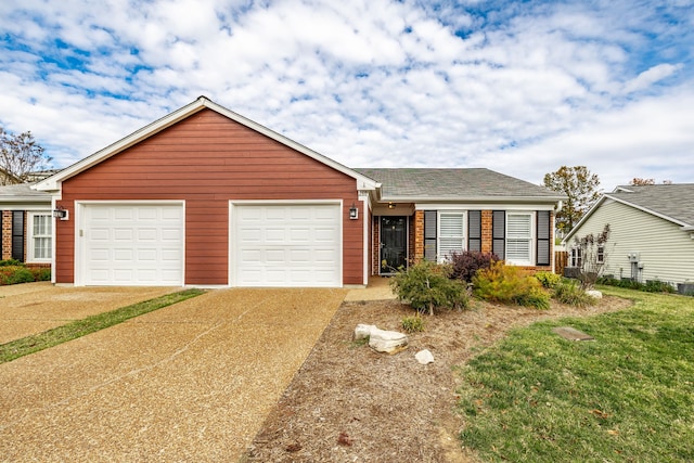 single story home with a garage