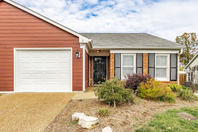 single story home with a garage