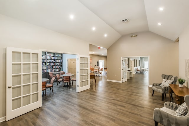 sitting room featuring french doors, dark hardwood / wood-style floors, and high vaulted ceiling