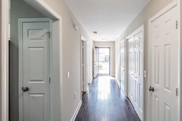 hall featuring dark hardwood / wood-style flooring