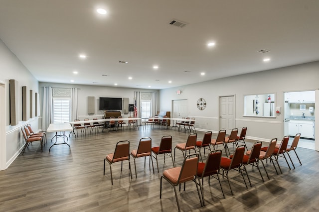 dining room with dark hardwood / wood-style flooring