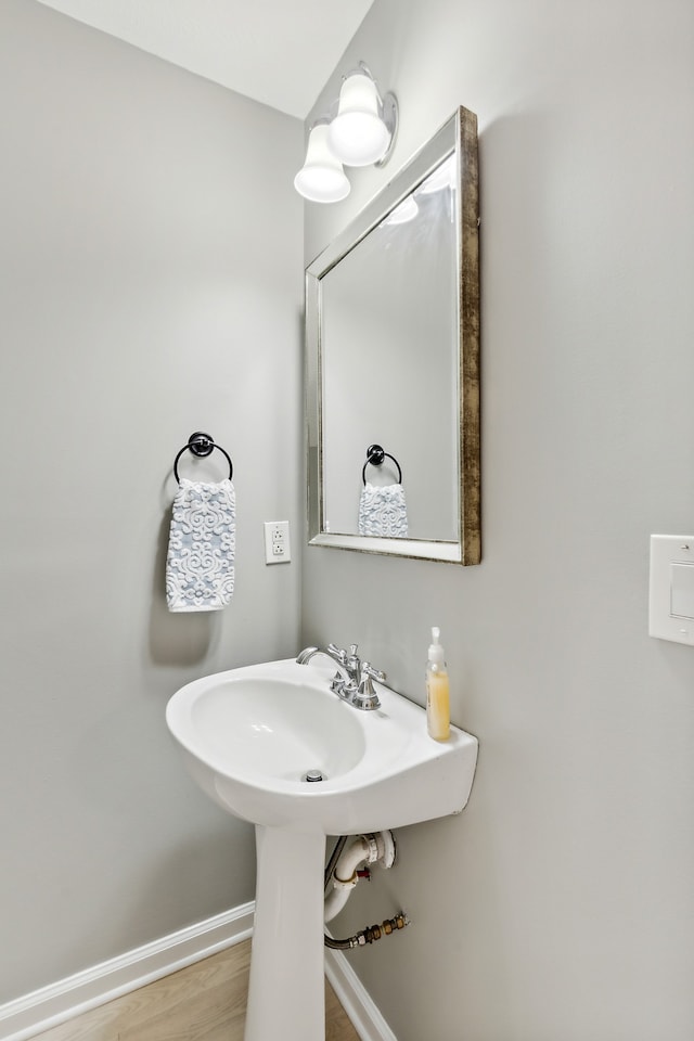 bathroom featuring hardwood / wood-style flooring