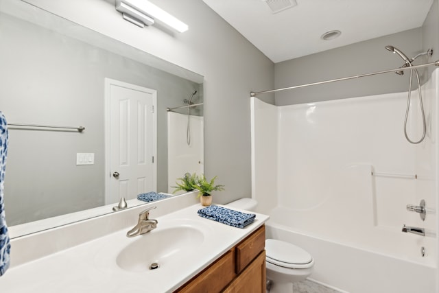 full bathroom featuring toilet, vanity, and shower / bath combination