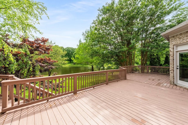 wooden terrace with a water view