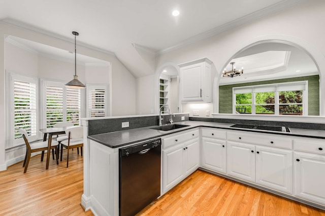 kitchen with white cabinetry, sink, black appliances, and light hardwood / wood-style flooring